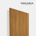 Toasted Pecan laminate by Micara with warm brown wood grain and smooth PU finish