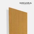 Yellow Meranti laminate by Micara with warm golden wood grain and textured finish